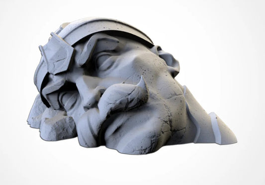Destroyed male statue head